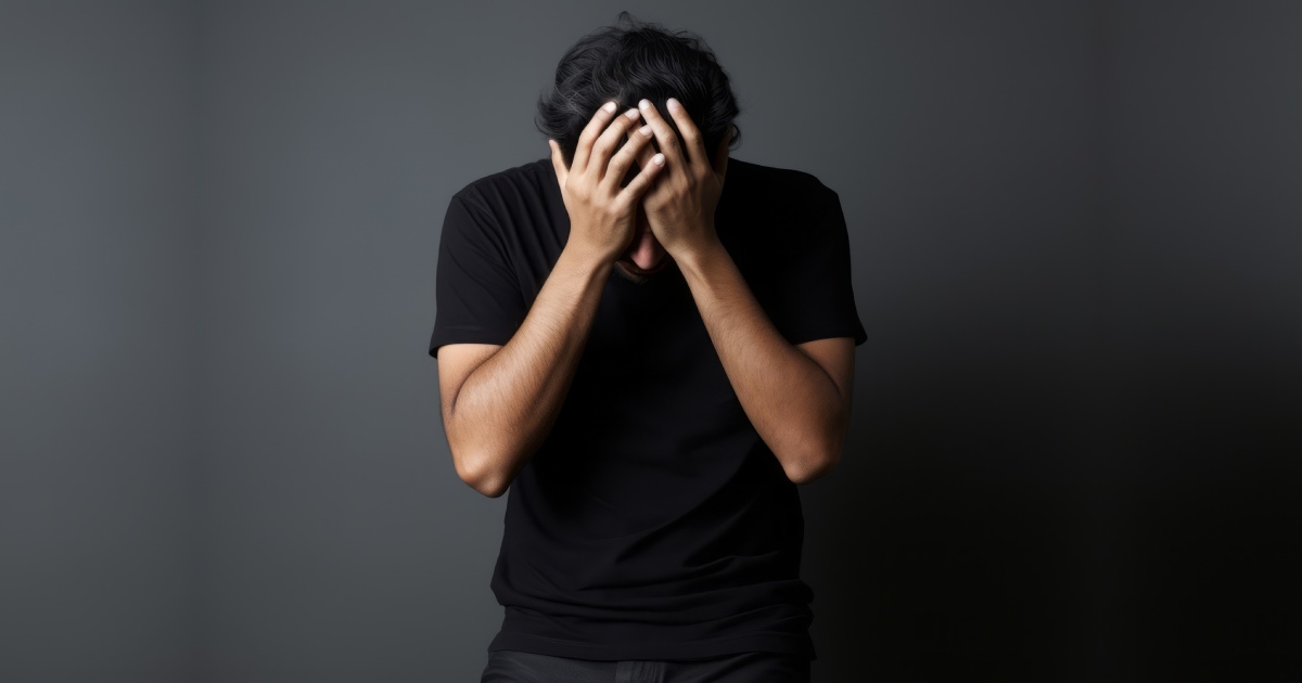 A thoughtful visual representation of a man sitting quietly in a modern space, symbolizing the critical need for understanding male silent depression.